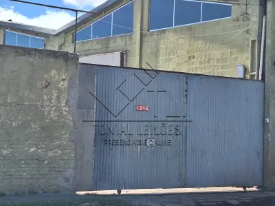 LOTE 001 - Imóvel situado Rua Três de Maio nº 1246